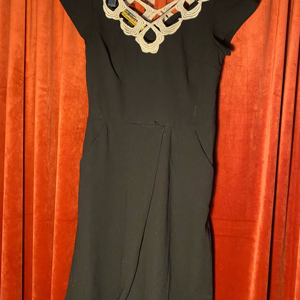 Elegant Black Dress with Unique Neckline